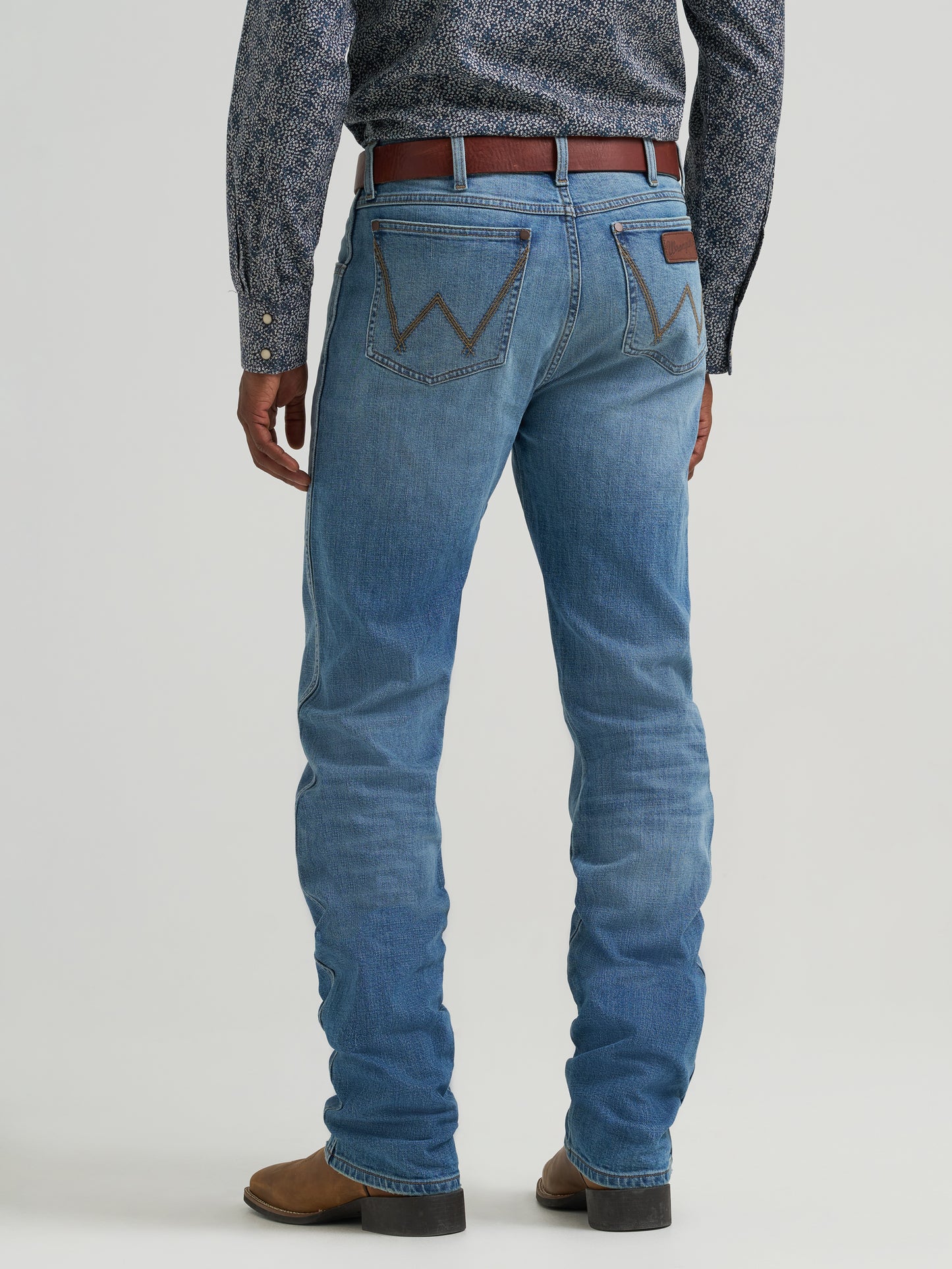112381601 Men's Retro Slim Fit Straight Leg Jeans by Wrangler