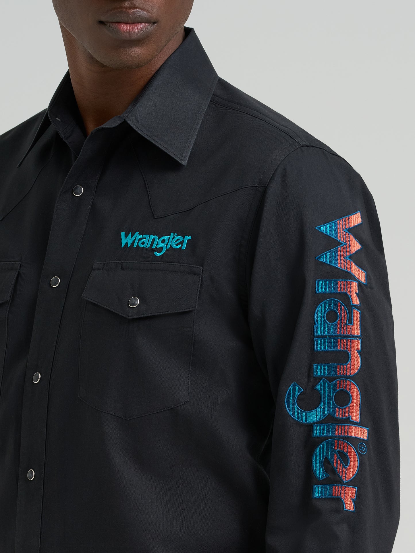 112381987 Men's Long Sleeve Snap Logo Shirt by Wrangler