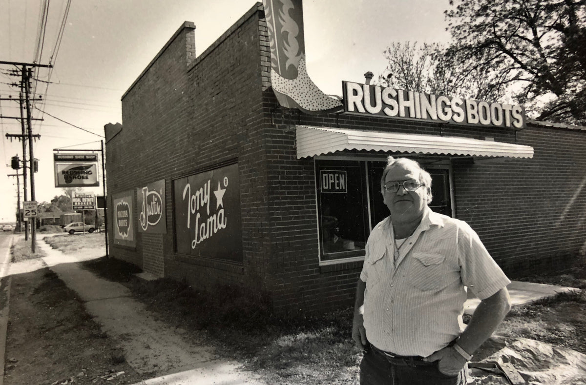 Black and white photo of the original Rushing Boots storefront in Ferriday