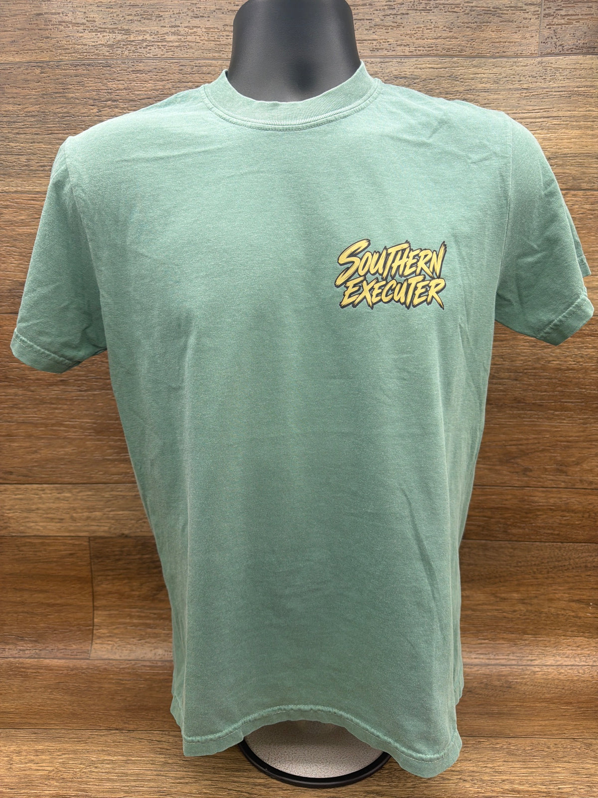 Bag Season graphic tee in Teal by Southern Executer, front