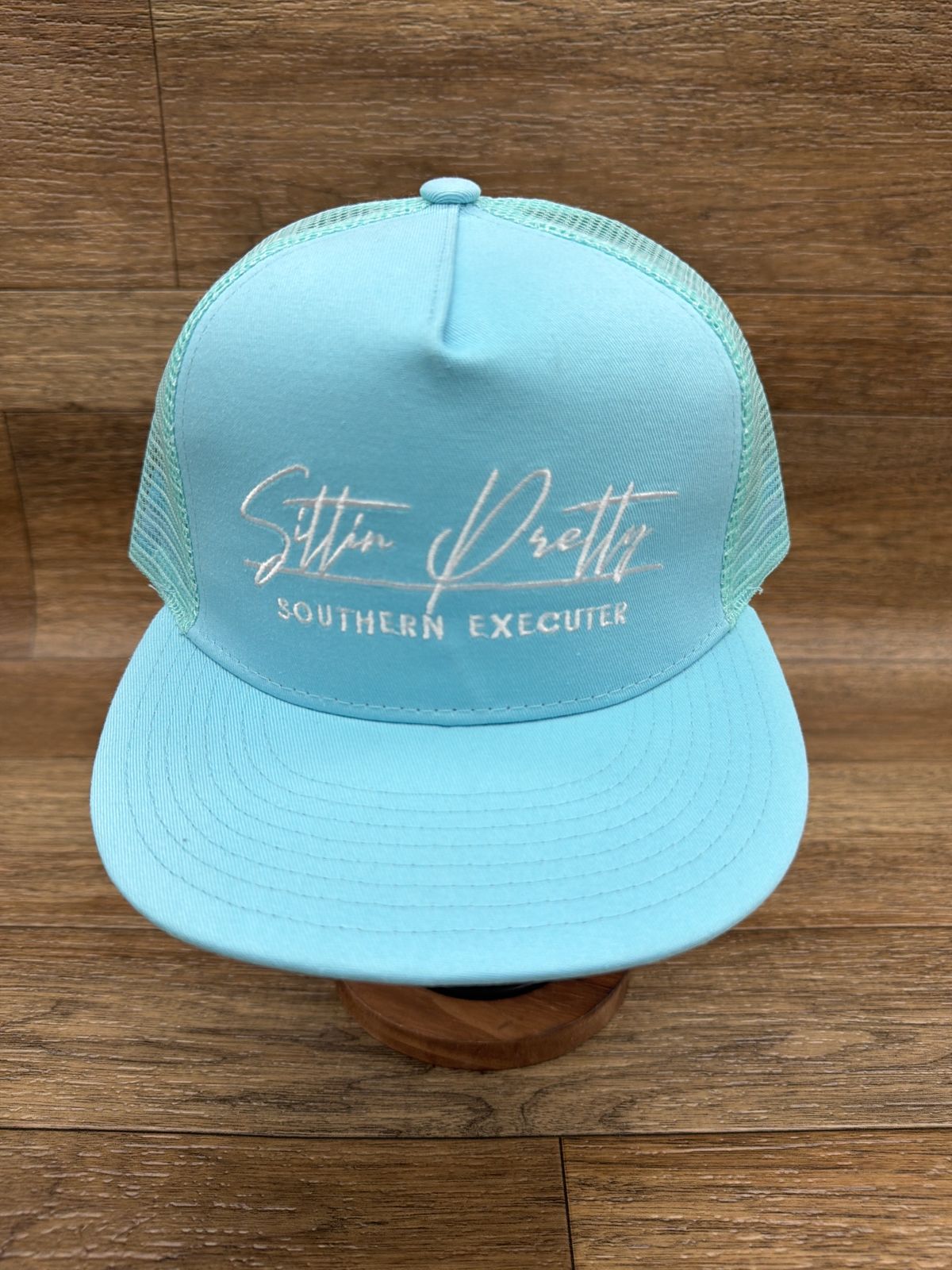 Sittin' Pretty flat brim trucker cap in Light Blue by Southern Executer, front