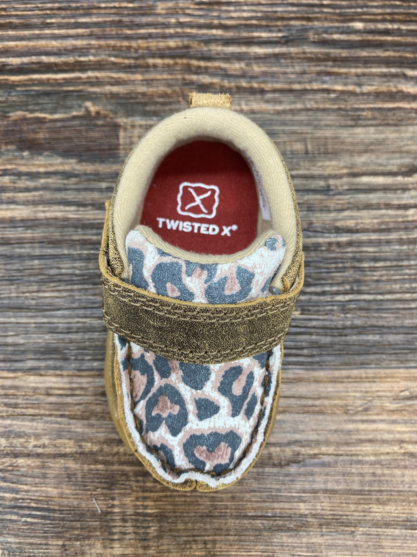 ica0007 Infant & Toddler Leopard Print Driving Moc by Twisted X